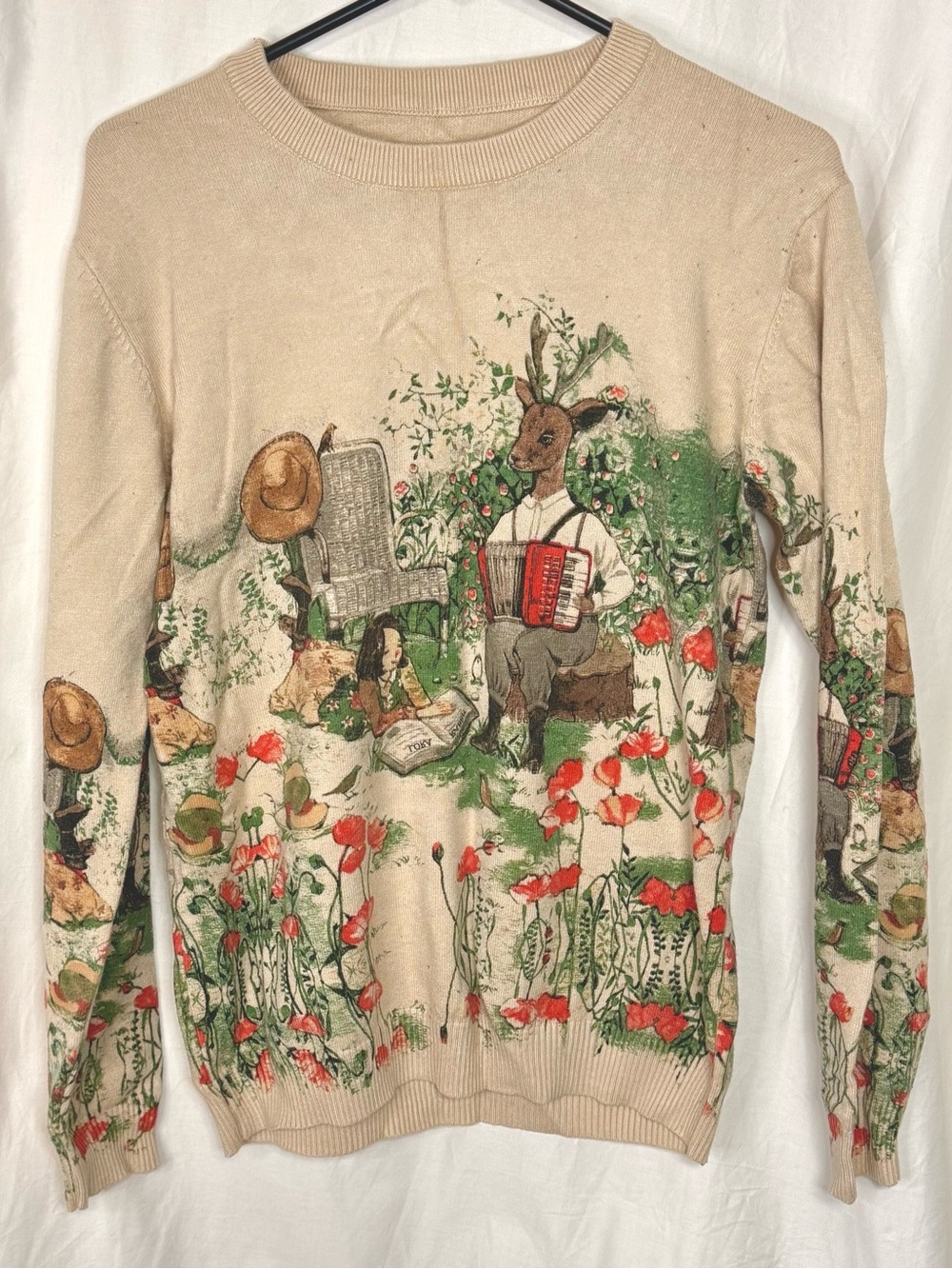 Unbranded Woman’s Beige Floral Graphic Novel Crewneck Sweater — Size Medium